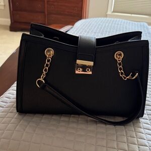 Anne Klein Black Handbag with Gold Accents
